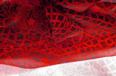 Doku, arka plan, desen. Yakut kırmızısı dantel kumaş, kırmızı ve siyah kumaşın karışımı. Kızarır, kızarır, kızarır, kızarır.