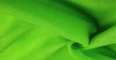 Doku. İpek yeşil mat renginin arkaplan dokusu (boya veya yüzey) sönük ve düzdür, parlaklığı yoktur..