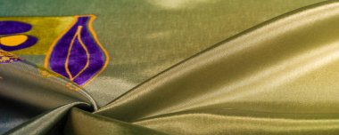 Arkaplan dokusu, ipek kumaş, parlak yeşil yeşil renk, küçük soyut kaya resimleri..