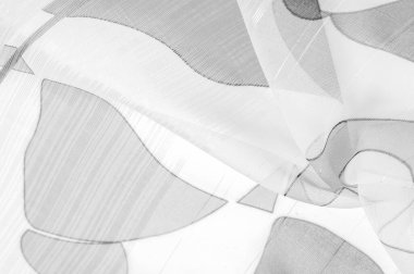Arka plan dokusu bir organza deseni. İnce, şeffaf kumaştan bir kumaş. İnce, yapışkan ipekten bir peçe gibi. siyah ve beyaz geometrik renkler