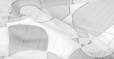 Arka plan dokusu bir organza deseni. İnce, şeffaf kumaştan bir kumaş. İnce, yapışkan ipekten bir peçe gibi. siyah ve beyaz geometrik renkler