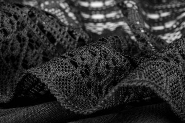 Arkaplan, doku, desen, siyah dantel kumaş, ince açık kumaş, genellikle pamuktan ya da ipekten yapılmış, halkalar, kıvrımlar ya da örgü iplikleriyle örülmüş.