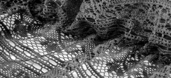 黑色花边织物 薄而开的织物 通常用棉线或丝线制成 用环线 捻或针织图案 — 图库照片