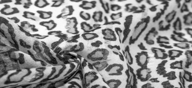 Doku, arkaplan, desen, ipek kumaş siyah beyaz leopar desenli. Hafif leopar desenli ipek tasarımınız için mükemmel, şık görünüyor ve kaba değil.!