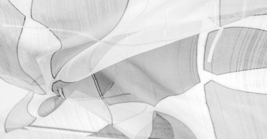 Arka plan dokusu bir organza deseni. İnce, şeffaf kumaştan bir kumaş. İnce, yapışkan ipekten bir peçe gibi. siyah ve beyaz geometrik renkler
