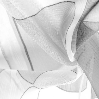 Arka plan dokusu bir organza deseni. İnce, şeffaf kumaştan bir kumaş. İnce, yapışkan ipekten bir peçe gibi. siyah ve beyaz geometrik renkler