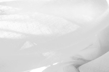 Doku. İpek beyaz mat renginin arkaplan dokusu (boya veya yüzey) sönük ve düzdür, parlaklığı yoktur.