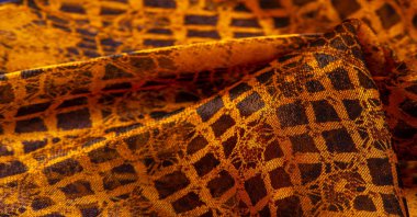 Doku, arka plan, desen. Altın dantel, siyah kumaşla sarı altın karışımı. kırmızı, ahtapot, metallerin kralı, toprak rengi