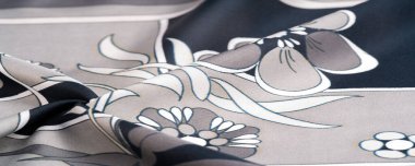 Doku, arkaplan, desen, beyaz çiçek desenli siyah ipek, geometrik çizgiler. Yeni, modern renk paletini tanıtır, herhangi bir tasarıma karmaşıklık eklemeyi ideal kılar.