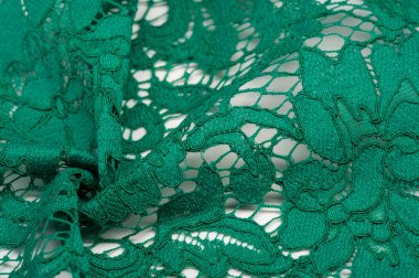 Doku, arkaplan, desen, yeşil dantel kumaş, kabartmalı dantel kumaş, her iki tarafında da istiridye var. Projeleriniz için uygun, tasarım, vs..