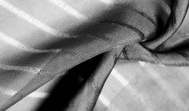 Doku, arkaplan, desen, çizgileri olan basit gri kumaş. İpliğin çıkarılması ile oluşan çizgiler,