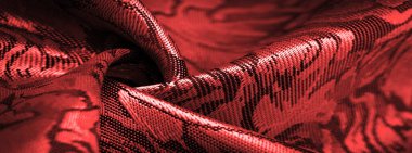 relief pattern, composite textiles, red silk fabric, with a floral pattern, unusually pleasant visual sensations: slippery, coolness, softness; beautiful appearance, unique luster;