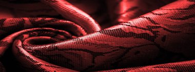 relief pattern, composite textiles, red silk fabric, with a floral pattern, unusually pleasant visual sensations: slippery, coolness, softness; beautiful appearance, unique luster;