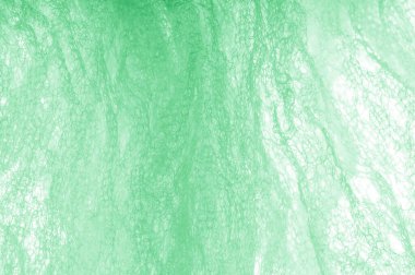 Örgü yeşilli kumaş. Dekorasyon ve tasarım için ruhani parlaklık bir çizgi ekleyin, bu kumaş zengin, zengin ve parlak bir ton vermek için iplikleri içine küçük ışıltılar Ton glitter.