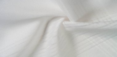 desen beyaz kumaş. Telio 'dan, bu organzanın ipek gazlı bezden daha ince ve keskin bir dokuması var. Bu lüks kumaşı her şey için kullan. Olasılıklar gerçekten sonsuz.!