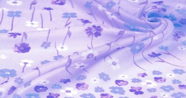 Arkaplan deseni, ipek kumaş, eflatun arkaplanda küçük çiçekler, baskılı ince bir gök mavisi rengi. Çiçek tasarımı