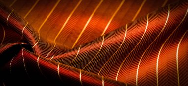 Kumaşın arkaplan dokusu, yakut kırmızısı rengi ince, güçlü, yumuşak, parlak lif kozaların üretiminde ipek böcekleri tarafından elde edilir ve iplik ve kumaş üretimi için birleştirilir..