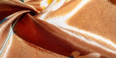 Doku, arkaplan, desen, çiçek desenli kahverengi ipek kumaş, parlak ışıkla çekilmiş fotoğraf.,