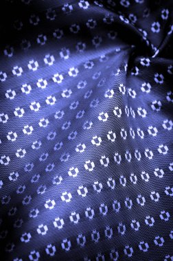 Arkaplan dokusu, dekoratif süs, gökyüzü mavisi ipek kumaş, mavi safir, ince, güçlü, yumuşak, parlak lifler koza yapımında ipek böcekleri tarafından üretilir ve iplik ve kumaş yapımında toplanır..