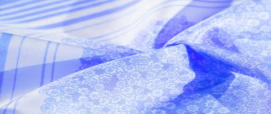 Doku, desen, beyaz arkaplanda mavi ipek kumaş, beyaz arkaplan dekoratif kursunda çiçek desenli siluet, kartpostal duvar kağıdı tasarımı. Projeniz başarılı olacak. İlham verici