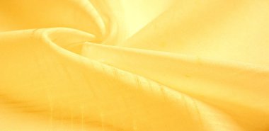 doku arka plan, model. İpek sarısı kumaş. Telio 'dan, bu organzanın ipek gazlı bezden daha ince ve keskin bir dokuması var. Bu lüks kumaşı her şey için kullan. Olasılıklar gerçekten sonsuz.!