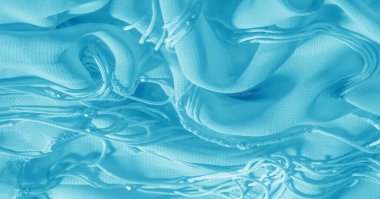 Arka plan, desen, doku, duvar kağıdı, mavi ipek kumaşın parlak bir parıltısı var. Bu çok yönlü bir kumaş. Tasarımının güzel aksanlarıyla yaratıcı ol..