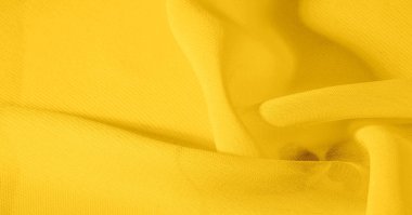 Arka plan, desen, doku, duvar kağıdı, sarı soluk ipek kumaş parlak bir parlaklık vardır. Bu en çok yönlü kumaştır. Tasarımınızın güzel vurgularıyla yaratıcı olun.