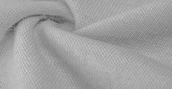 白色毛织物 细软卷曲或波浪形的毛 形成绵羊 山羊或类似动物的毛 尤指用于生产织物或纱线时 — 图库照片