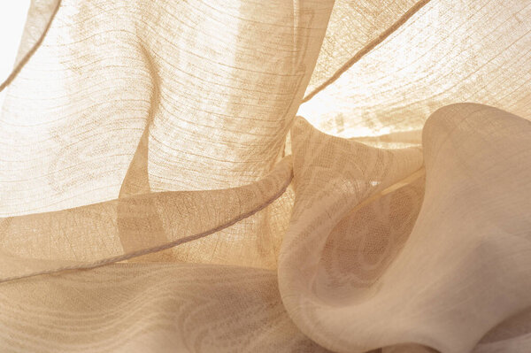 Texture, background, pattern, sensation, cambric - very thin translucent soft mercerized fabric, beige