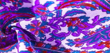 Arka plan dokusu, desen, desenli kumaş pamuk. Özgür Ruh için Kaffe Fassett tarafından tasarlanan bu büyük desenli paletin renk tonları, sıcak pembe, kobalt mavisi, fuşya ve mor ile yeşilin tonlarıdır..