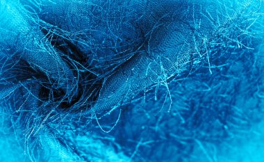 Arkaplan dokusu, dekoratif süs, mavi ipek kumaş, kumaşta dokuma iplikleri, kabarık efekt, his, görünüş veya yüzey dokusu