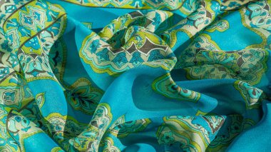 texture, background, multicolored silk fabric with a pattern of patterns on a turquoise background, clipart