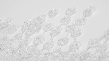 Doku, arkaplan, desen, kartpostal, ipek kumaş, dantel ambalajlı kadın beyaz atkısı. Yazdırma ve dijital materyallerinizi oluşturmak için bu süslü resimleri kullanın.