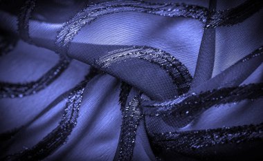 Doku arkaplan resmi, kumaş şeffaf koyu mavi, parlak doğuştan gelen çizgilerle, ışığın içinden geçmesine izin veren madde, böylece nesneler açıkça görülebilir..