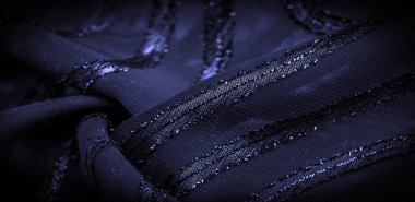 Doku arkaplan resmi, kumaş şeffaf koyu mavi, parlak doğuştan gelen çizgilerle, ışığın içinden geçmesine izin veren madde, böylece nesneler açıkça görülebilir..