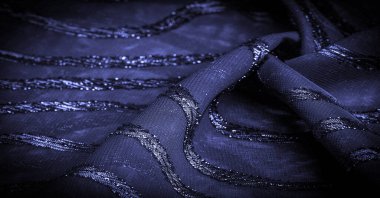 Doku arkaplan resmi, kumaş şeffaf koyu mavi, parlak doğuştan gelen çizgilerle, ışığın içinden geçmesine izin veren madde, böylece nesneler açıkça görülebilir..