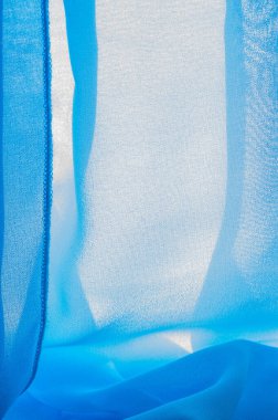 doku arkaplan deseni. Mavi ipek kumaş. Hafif bir yapay ipek kumaş. Dupioni kumaşı. Tasarımınız, aksanınız, duvar kağıtlarınız, posterleriniz ve kartlarınız için mükemmel..