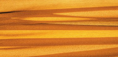 İpek kumaş Arka plan dokusu. Bu doğal sarı bir eşarp, şeffaf bir el ve harika bir sheen ile rayon yapılmış bu güzel naylon saten projeleriniz için mükemmel.