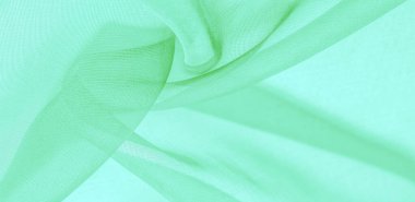 Yeşil ipek kumaş dokusu. Tasarımınız, giysileriniz ve posterleriniz için de mükemmel. Güzel proje aksanlarıyla yaratıcı ol. Bu kumaş senin ilham kaynağın..