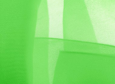 doku arkaplan deseni. İnce bir mat parıltısı olan yeşil ipek kumaş. Dizaynınız, aksanınız, duvar kağıtlarınız, posterleriniz ve kartpostallarınız için mükemmel..