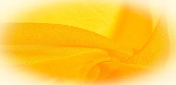 Texture of yellow silk fabric. It is also perfect for your design, clothes, posters. Be creative with beautiful project accents. This fabric is inspired by your inspiration.