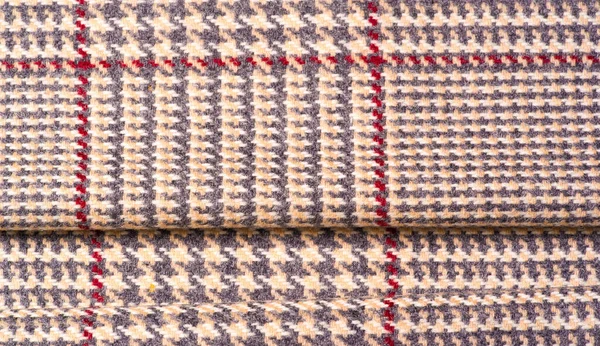 Background texture, pattern. The fabric is thick, warm in a cage, beige. This is 100% wool terry dressing. Sinil has a soft pile and is very versatile. It fits your design. — Stock Image Background Texture Pattern Fabric Thick Warm Cage Beige 100 Wool Royalty Free Stock Images