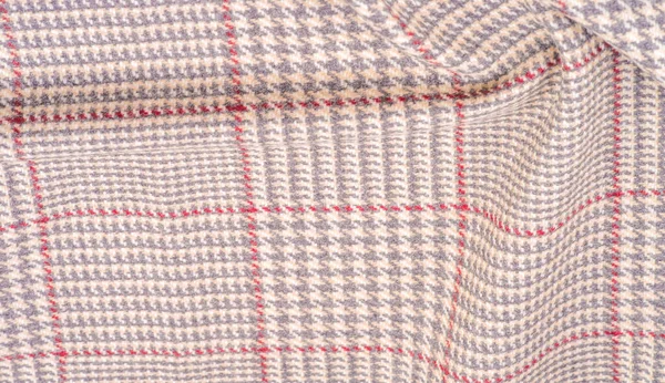 Background texture, pattern. The fabric is thick, warm in a cage, beige. This is 100% wool terry dressing. Sinil has a soft pile and is very versatile. It fits your design. — Stock Image Background Texture Pattern Fabric Thick Warm Cage Beige 100 Wool Royalty Free Stock Photos