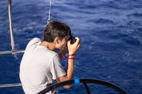 Beautiful Young Man Yacht Vacation Mediterranean Sea Takes Some Photos — Stock Photo, Image