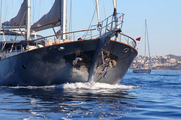 Wooden sailing ship is on the sea. Details and close-up. Sunny weather at sea