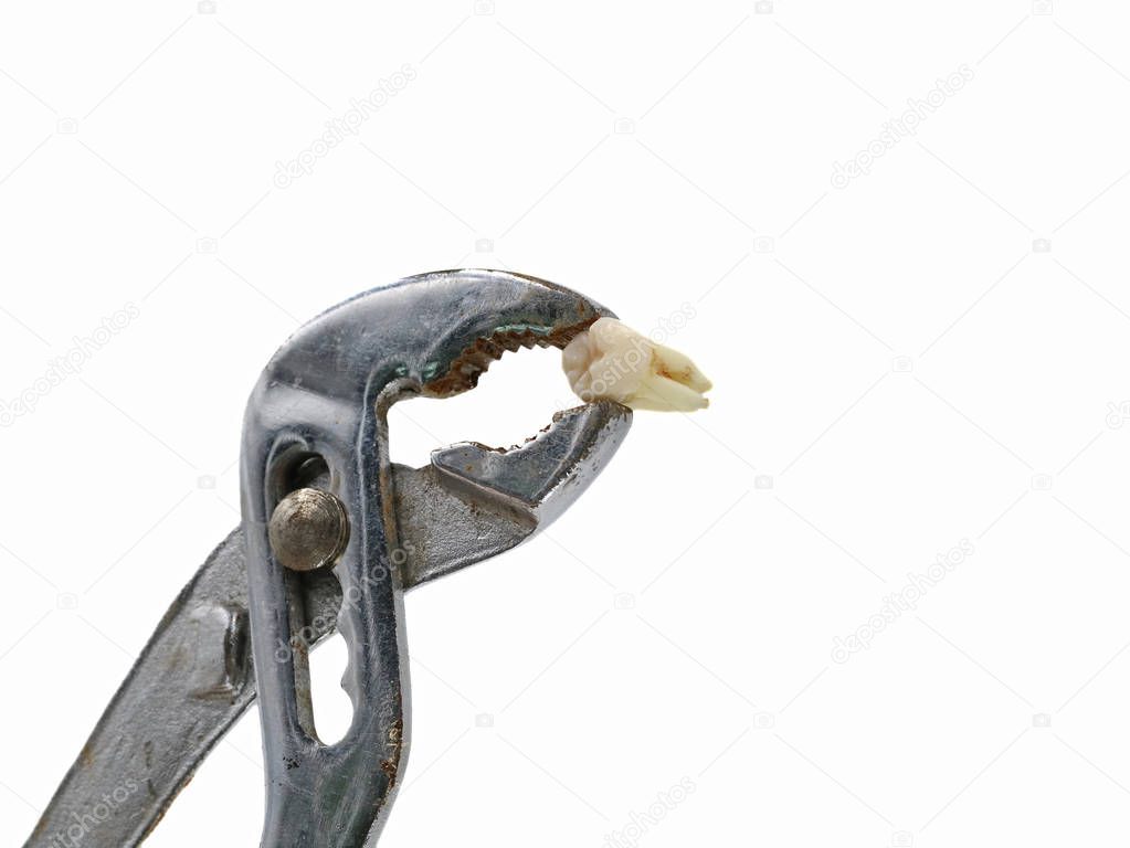 Pulling a tooth with rusty plumber pliers isolated on white with copy space