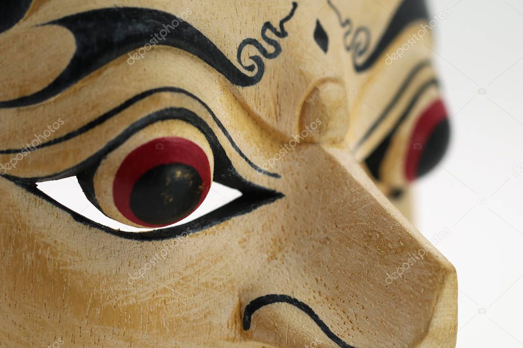 close up of Indonesian mask, topeng, maschera on white background