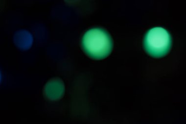 Soyut renkli, odaklanmış dairesel fakül. Bokeh bulanık renk ışığı arka planı kullanabilir. Yeni yıl Bokeh feshi