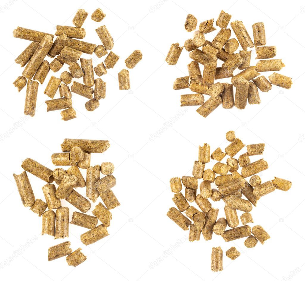 Collage wood pellets  isolated white background. natural pile of wood pellets. organic biofuels texture. Alternative biofuel from sawdust. The cat litter. pile of compressed wood pellets.