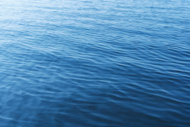 Baykal Gölü 'nün mavi sularının su yüzeyi. doku arkaplanı